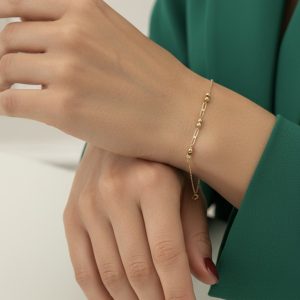 دستبند زنجیر و گوی طلا